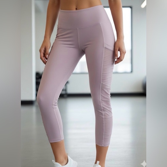 Fabletics Pants - Fabletics PowerHold Mauve Pink Leggings with Mesh Side Pockets.